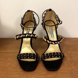 Black Prada stilettos with wood beading